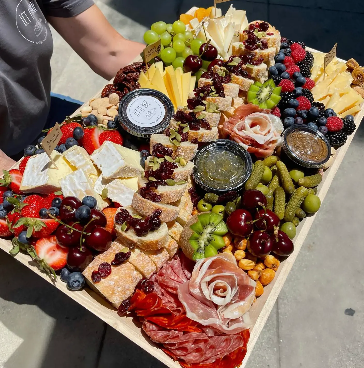 Close-up of a Let It Brie charcuterie board